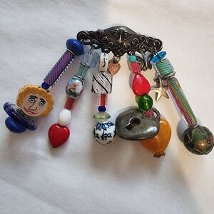 Colorful Beaded Brooch with Face Design